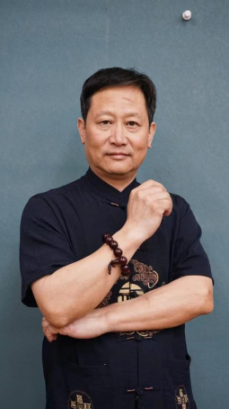 屈明贵